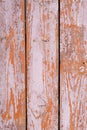 Old shabby wooden fence painted faded brown Royalty Free Stock Photo