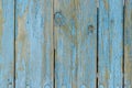 Old shabby wooden planks with cracked blue color paint, Rural country background Royalty Free Stock Photo