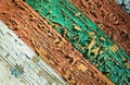 Old shabby wooden planks with cracked color paint, background. multicolor Royalty Free Stock Photo