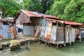 Old shack slum house near Malacca river Royalty Free Stock Photo