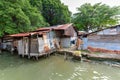 Old shack slum house near Malacca river Royalty Free Stock Photo