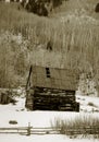 Old shack in snow