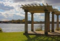 Old shaded arbor over Seneca lake. Royalty Free Stock Photo