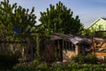 Old shed in the backyard at summer.