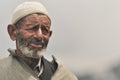 Old shepherd looking to the mountains Royalty Free Stock Photo