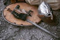 Old shield with sword and helmet Royalty Free Stock Photo