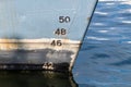 Old ship draft on hull, scale numbering. Distance between waterline and bottom keel Royalty Free Stock Photo