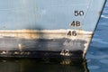 Old ship draft on hull, scale numbering. Distance between waterline and bottom keel Royalty Free Stock Photo