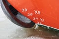 Old ship draft on hull, scale numbering, waterline Royalty Free Stock Photo