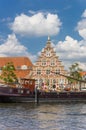 Old ship and historic facade in the center of Leiden Royalty Free Stock Photo