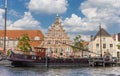 Old ship and historic facade in the center of Leiden Royalty Free Stock Photo