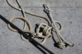 Old Ship rope knot on pier background Royalty Free Stock Photo