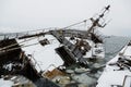 Old ship sank at the pier Royalty Free Stock Photo