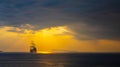 Old ship silhouette in sunset scenery Royalty Free Stock Photo