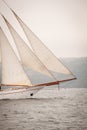 Old ship with white sales, sailing in the sea Royalty Free Stock Photo