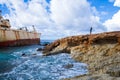 Old ship wreck and girl. Blue water beach. Travel photo 2018, d