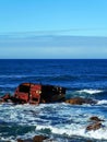 Old ship wreck stranded on the shore Royalty Free Stock Photo