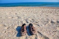 Old shoes on the beach Royalty Free Stock Photo