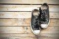 Old shoes hanging on a wooden Royalty Free Stock Photo