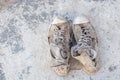 Old shoes left on the floor of the house screaming cracking. Royalty Free Stock Photo