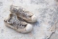 Old shoes left on the floor of the house screaming cracking. Royalty Free Stock Photo