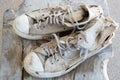 Old shoes left on the floor of the house screaming cracking. Royalty Free Stock Photo