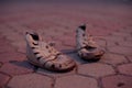 Old shoes for poor child Royalty Free Stock Photo