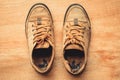 Old shoes on wood background. Royalty Free Stock Photo