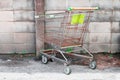 An Old Shopping Cart isolate on background close up Royalty Free Stock Photo