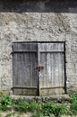 Old shutter door brick wall Royalty Free Stock Photo