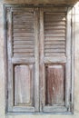 An old, shuttered wooden window Royalty Free Stock Photo