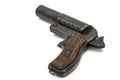 Old signal pistol, flare gun with the hammer cocked, isolated Royalty Free Stock Photo