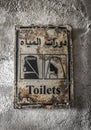 Old signboard of toilet Royalty Free Stock Photo