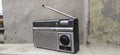 An old silver black radio that is broken Royalty Free Stock Photo