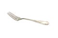 Old silver fork on white background