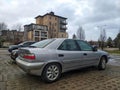 Old silver grey veteran classic French sedan car Citroen Xsara parked