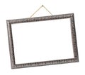 Old silver picture frame hanging on a rope Royalty Free Stock Photo