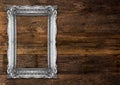 Old Silver Picture Frame on wooden background Royalty Free Stock Photo