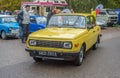Old simple cheap east German car Wartburg driving at a car show