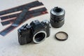 Old single lens reflect camera, lens, filter and films Royalty Free Stock Photo