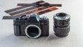 Old single lens reflect camera, lens, filter and films Royalty Free Stock Photo