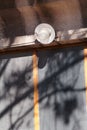 An old a single light bulb and lamp outdoor at front wall door of house, closeup Royalty Free Stock Photo