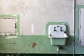 Old sink for washing hands inside the diner kitchen area from the Cellhouse Building of Alcatraz Prison San Francisco California Royalty Free Stock Photo