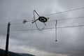 An old ski lift where with the help of a rope and a rod with a plastic plate, which the skier denies, or s sits down and lets hims