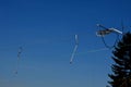 An old ski lift where with the help of a rope and a rod with a plastic plate, which the skier denies, or s sits down and lets hims