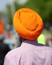 Old skih man with orange turban and long beard