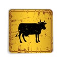 Old skratched yellow road sign with cow silhouette Royalty Free Stock Photo