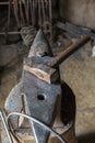 Old Sledge on an anvil in a workshop Royalty Free Stock Photo