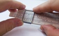 Old slide rule slipstick analogue computer for mathematical calcululs Royalty Free Stock Photo