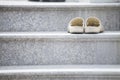 Old slippers on the staircase Royalty Free Stock Photo
